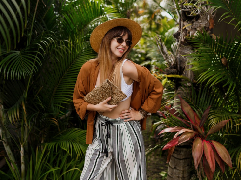 fashion-image-sexy-graceful-woman-straw-hat-posing-tropical-palm-leaves