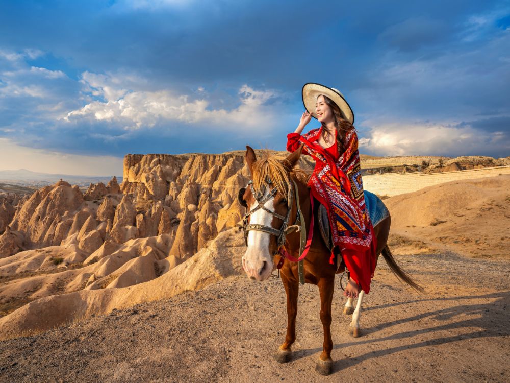 tourists-enjoy-ride-horses-cappadocia-turkey