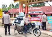 Jum’at Berkah, Polisi Bagikan Nasi Kotak Kepada masyarakat Bahorok