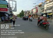 Polisi Hadir di Jalan Raya Sejak Pagi, Sat Lantas Polres Langkat Wujudkan Keamanan dan Kelancaran Aktivitas Masyarakat.